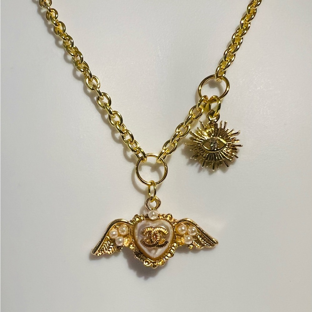 Gold Winged Heart Pendant Necklace